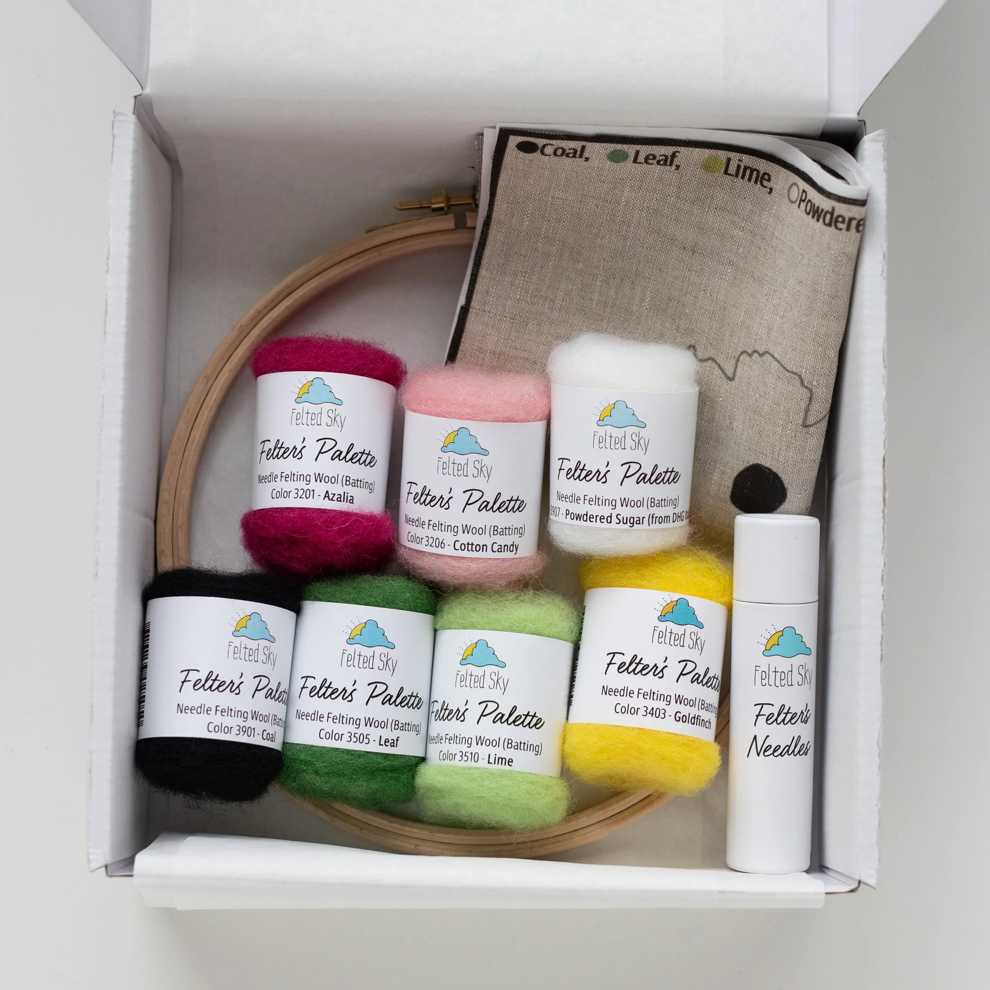 A Cosmos Flower Needle-felting Kit containing a variety of felt colors and a needle.